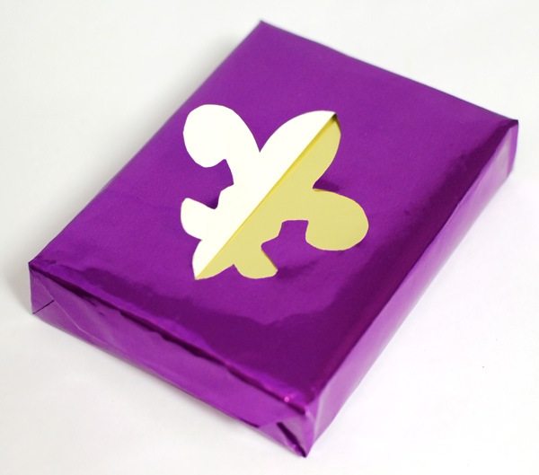 diy gift wrap mardi gras cut out fleur de lis wrapping idea